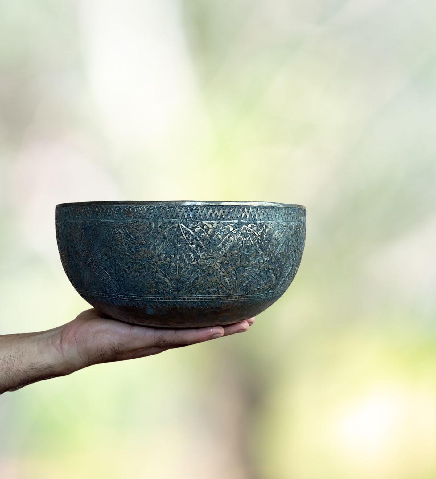 Vintage Flower Carved Singing Bowl for sound therapy.