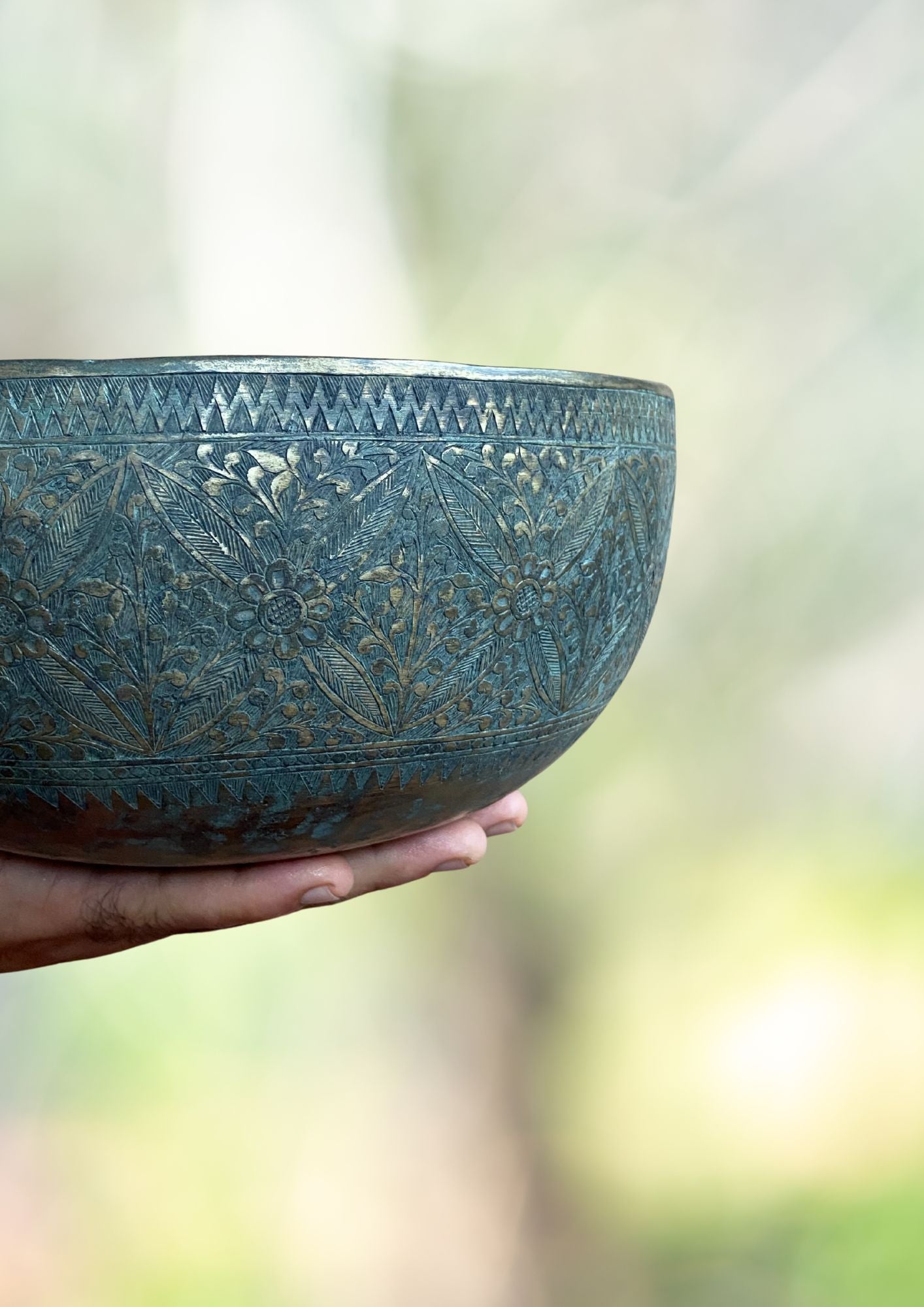 Vintage Flower Carved Singing Bowl for sound therapy.