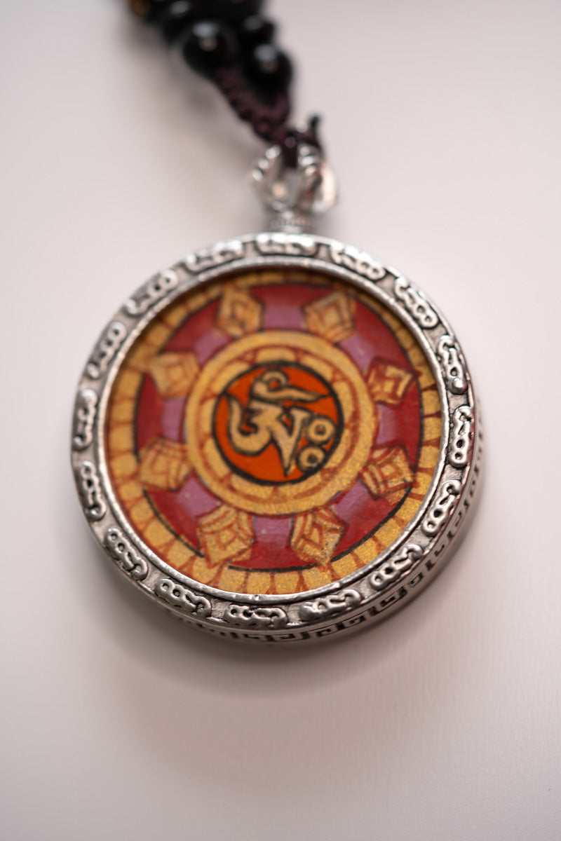 Tibetan Om Ghau Thangka with Locket