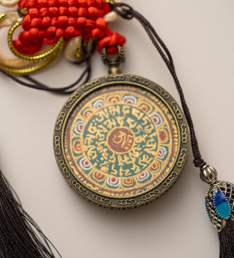 Tibetan Om Mantra Locket with Tassel