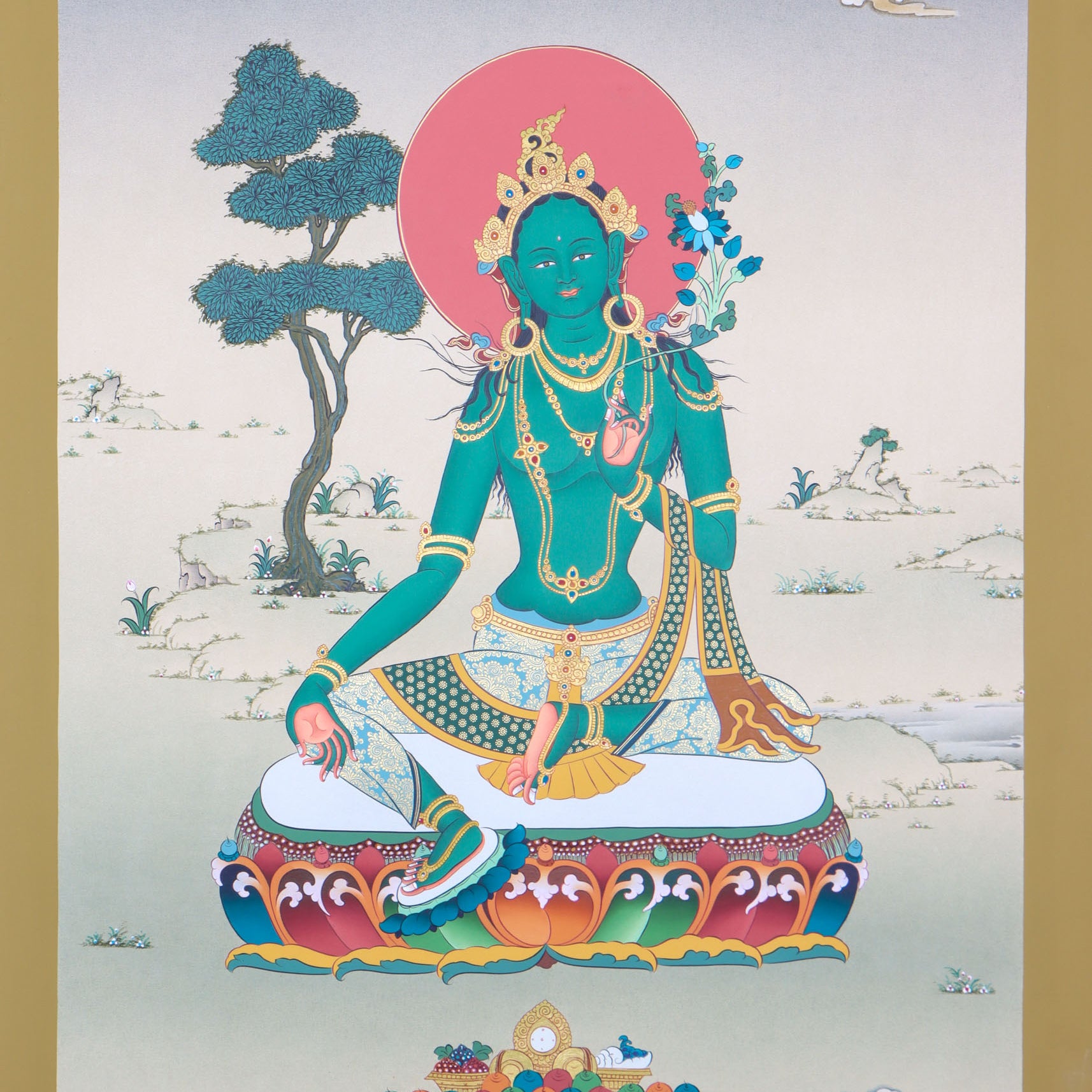 Green Tara thangka is a holy depiction of the famed Buddhist goddess.