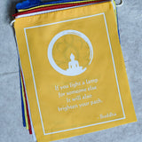 Buddha quote-adorned prayer flag