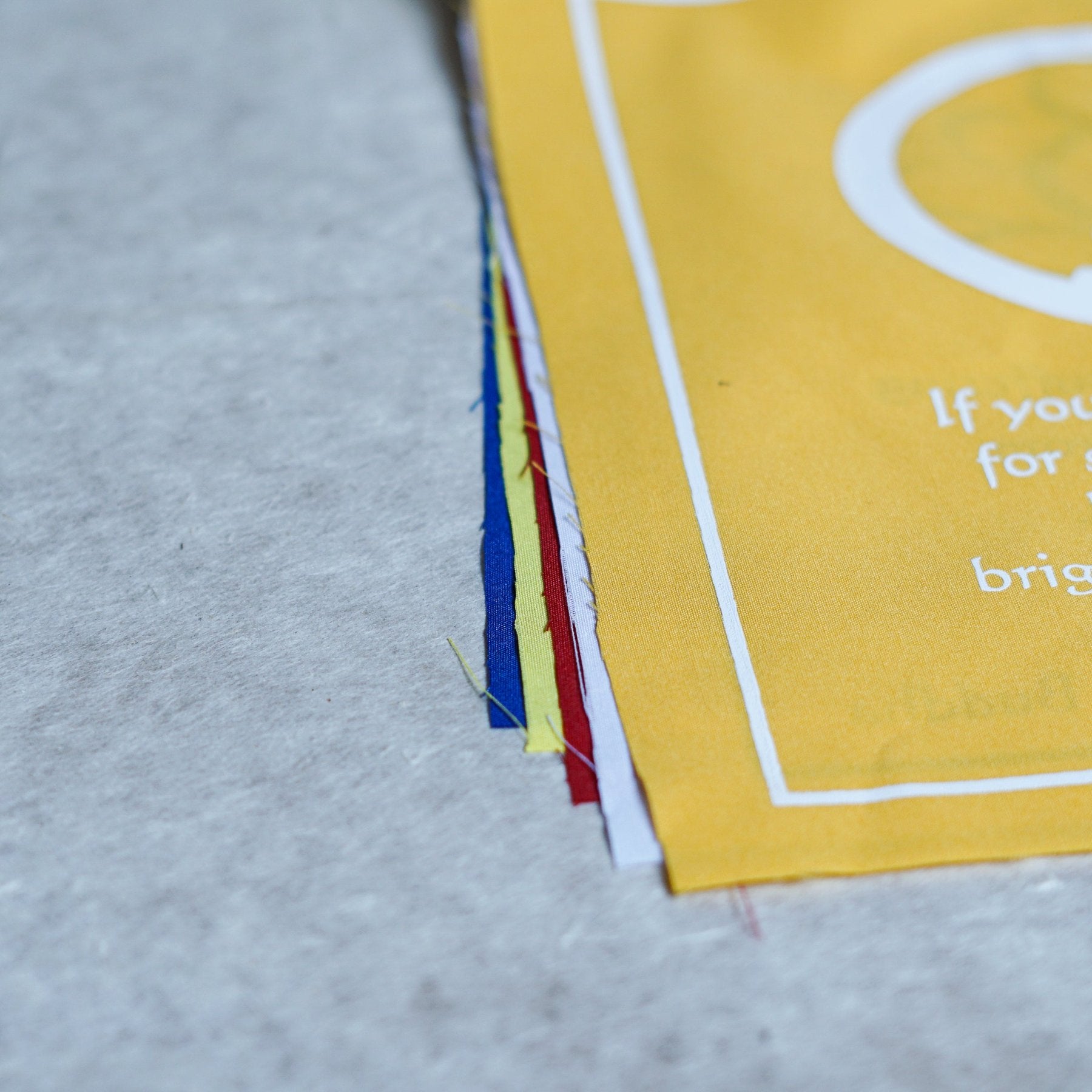 Buddha quote-adorned prayer flag