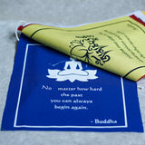 Buddha quote-adorned prayer flag