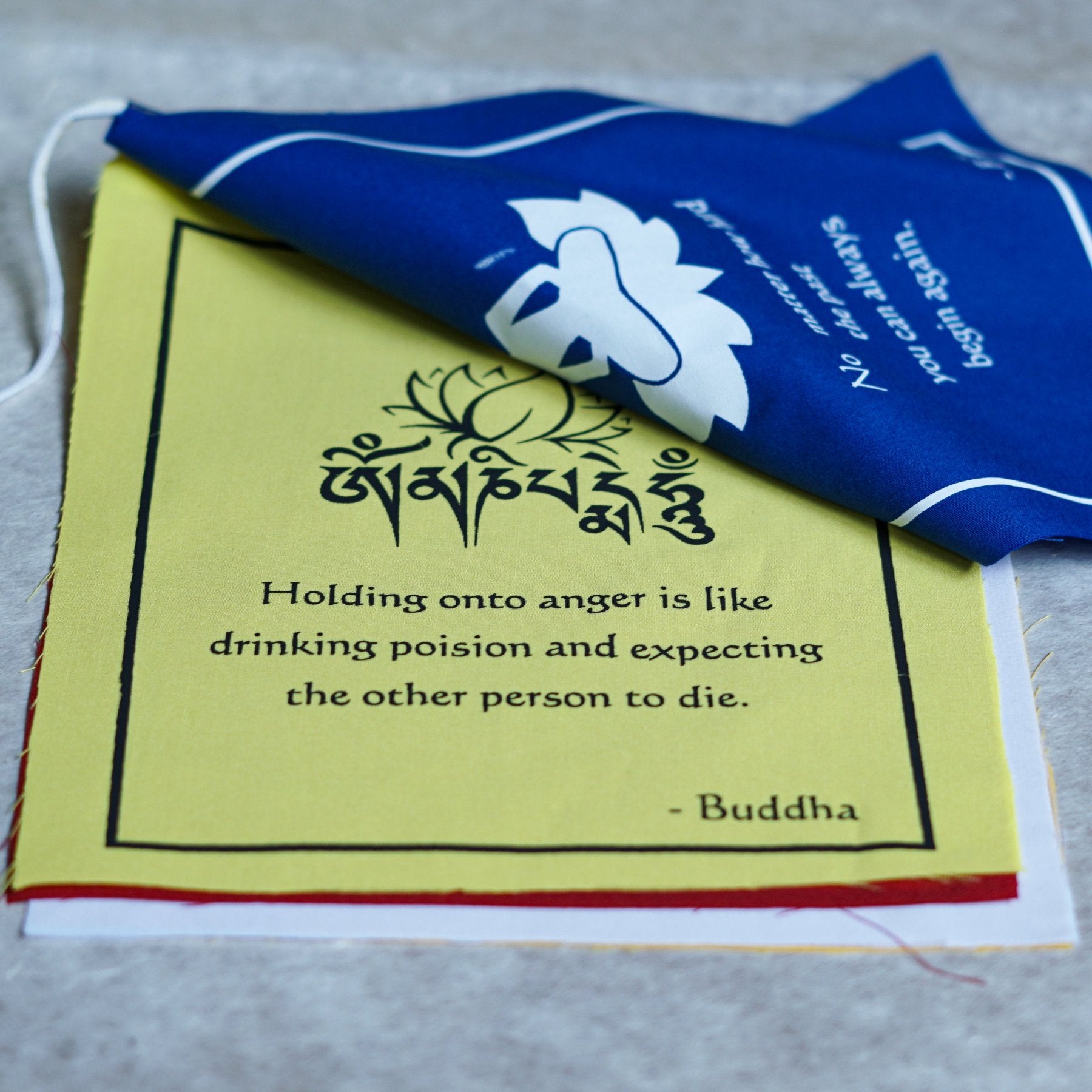 Buddha quote-adorned prayer flag