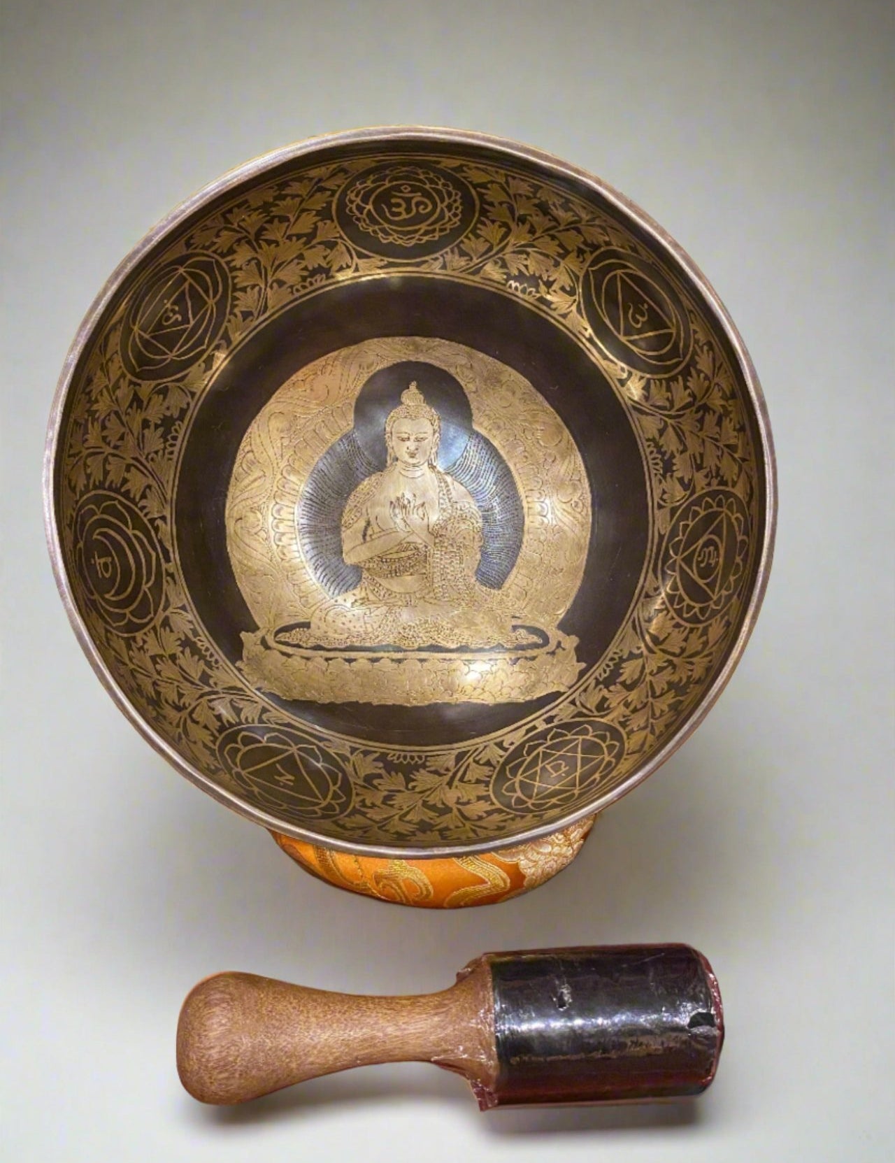 Vairochana Buddha Carved Singing Bowl - Tibetan Bowl for meditation.