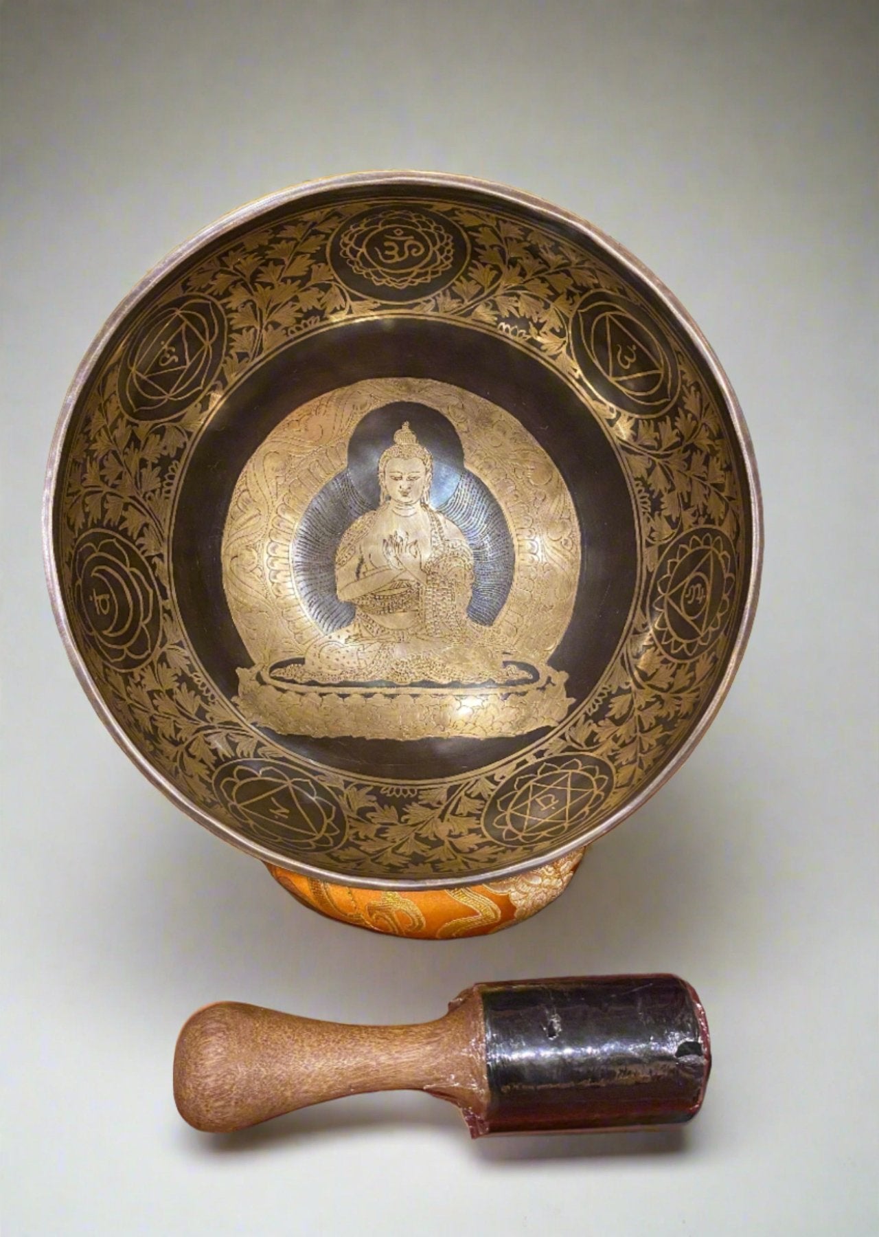 Vairochana Buddha Carved Singing Bowl - Tibetan Bowl for meditation.