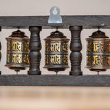 Wood Stand Prayer Wheel for home decor and spirituality.