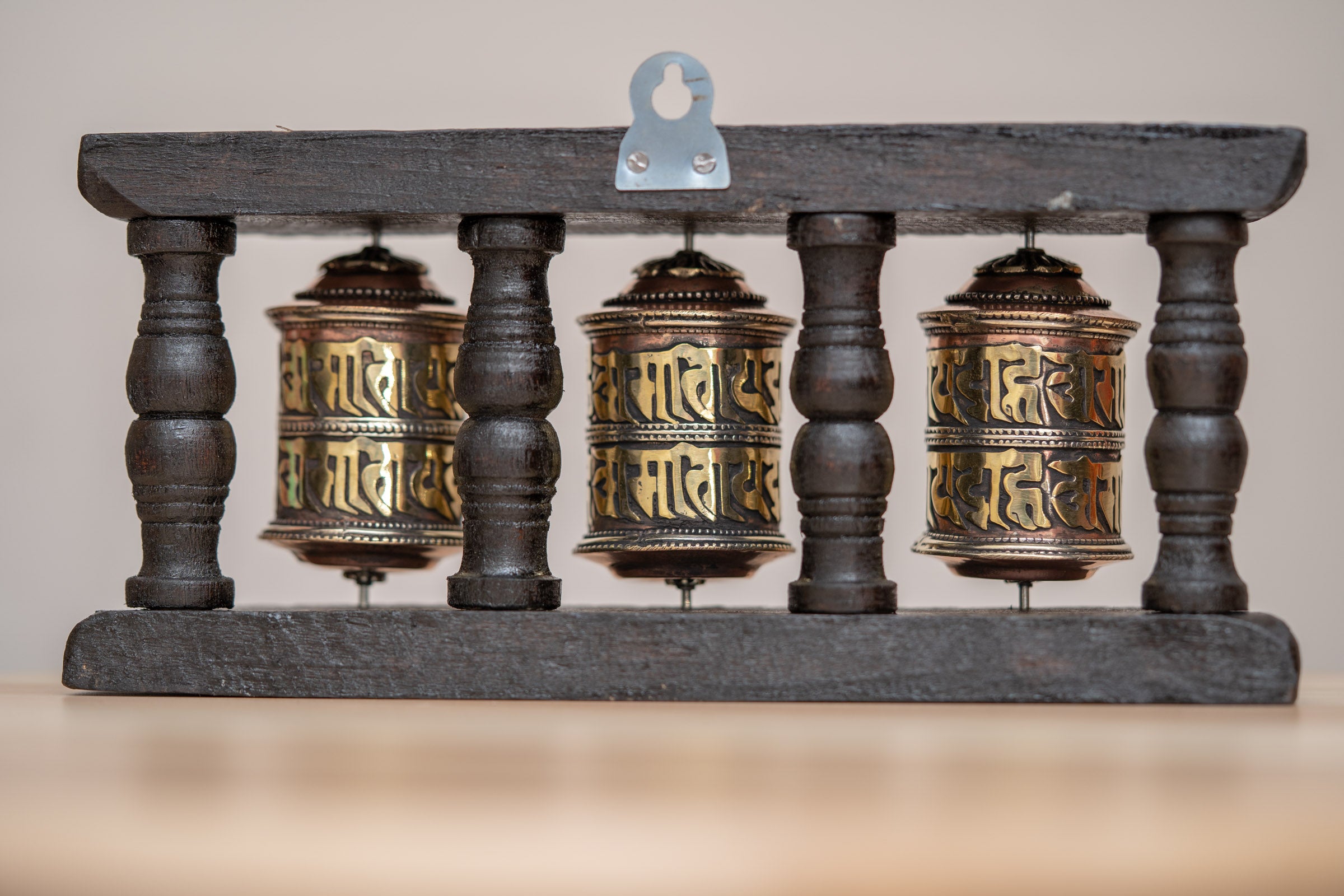 Wood Stand Prayer Wheel for home decor and spirituality.