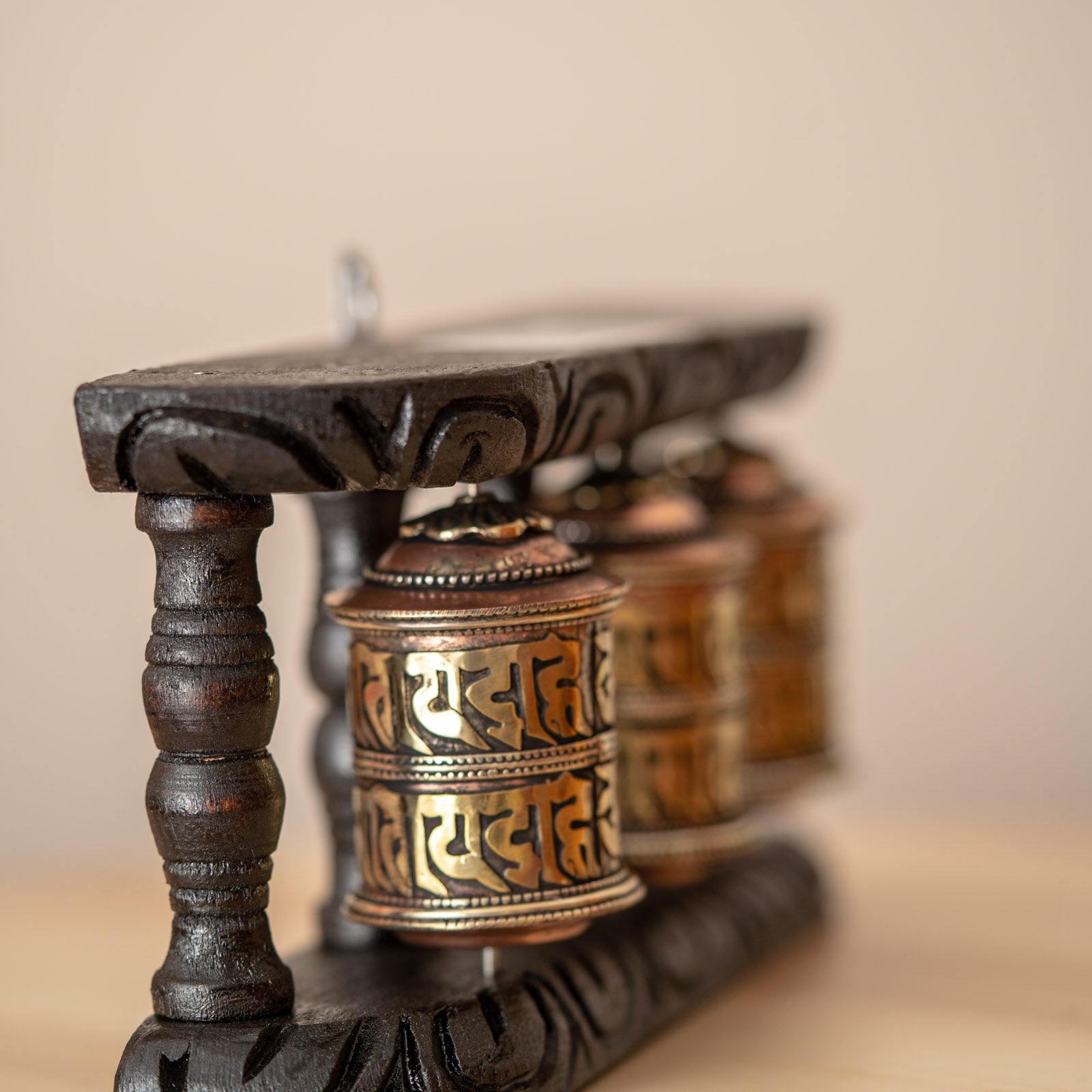 Wood Stand Prayer Wheel for home decor and spirituality.