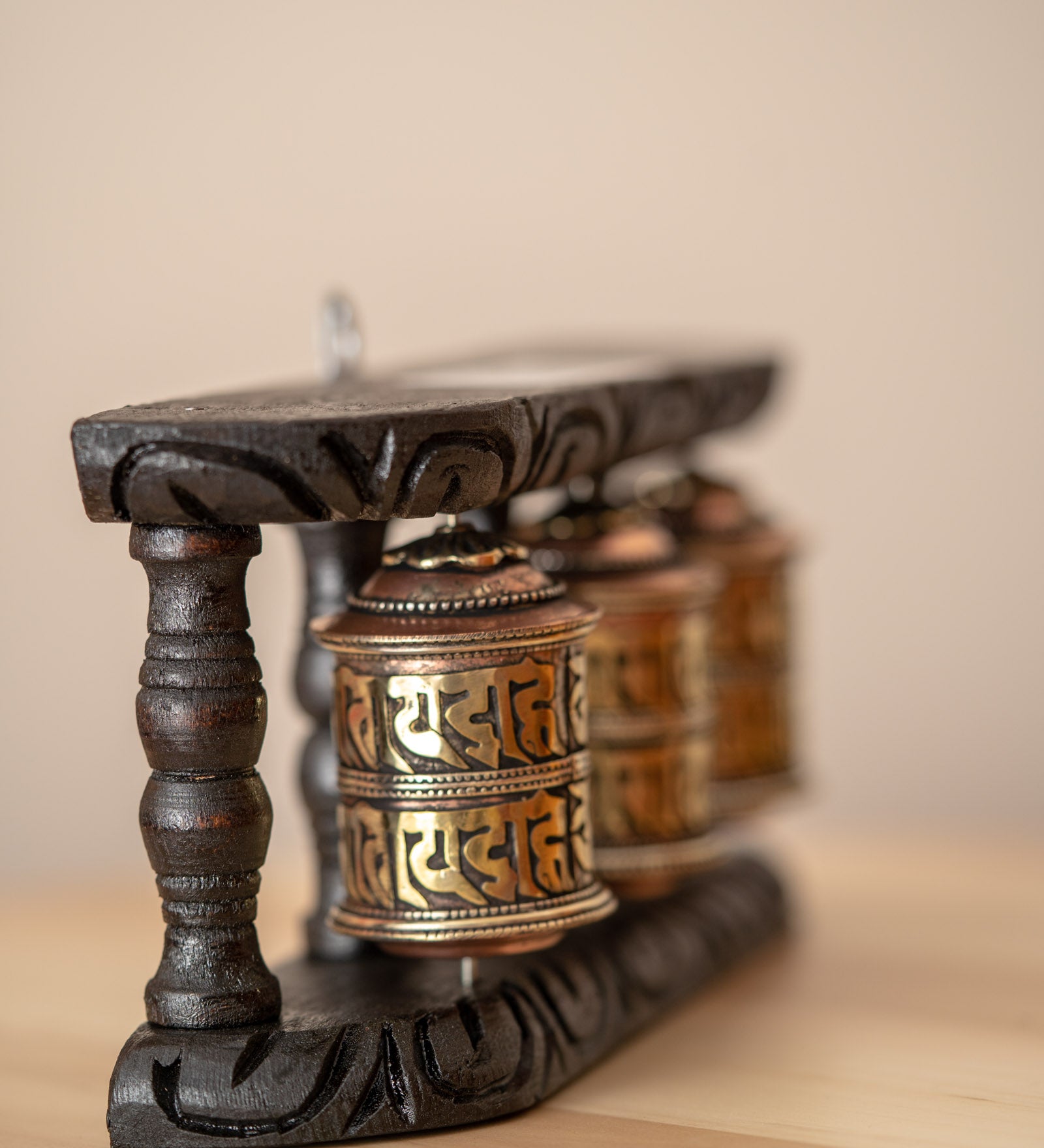 Wood Stand Prayer Wheel for home decor and spirituality.