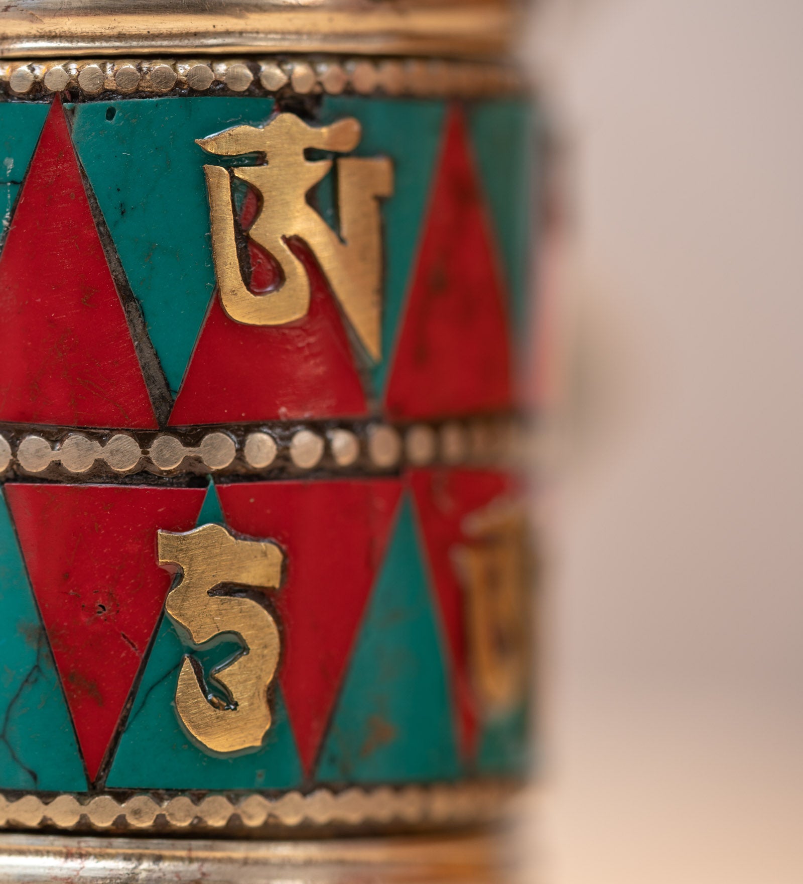 Prayer wheel with endless knot symbol for spiritual practice .