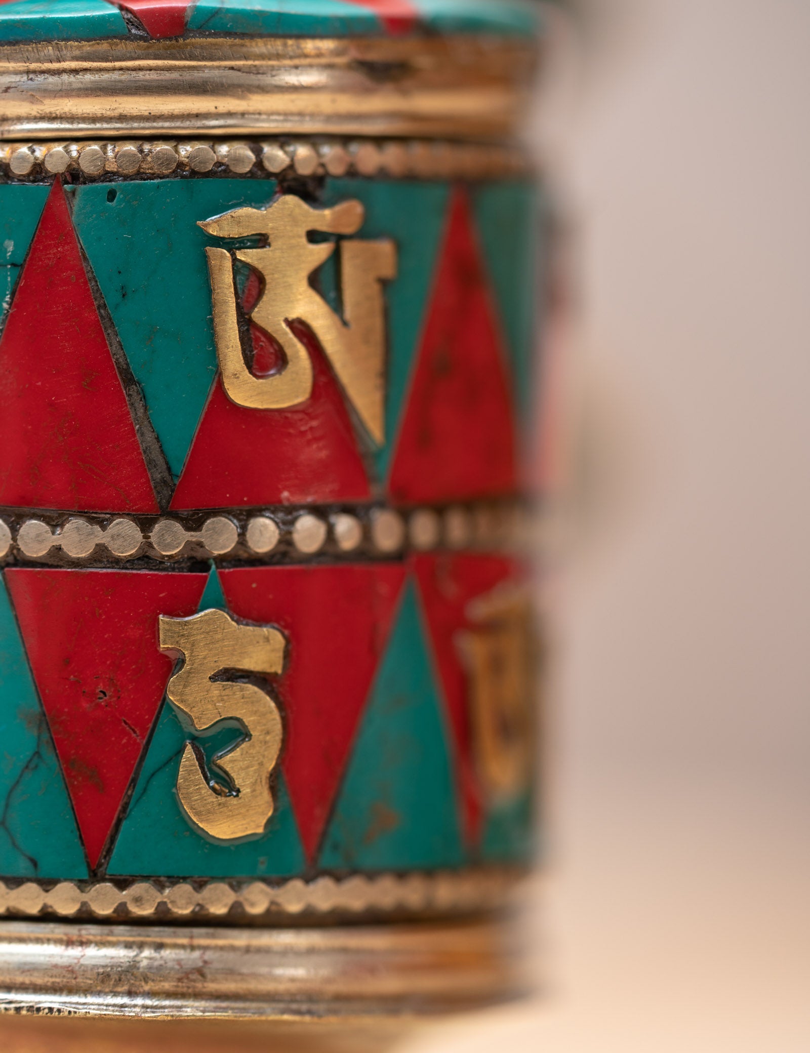 Prayer wheel with endless knot symbol for spiritual practice .