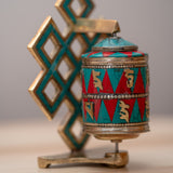 Prayer wheel with endless knot symbol for spiritual practice .