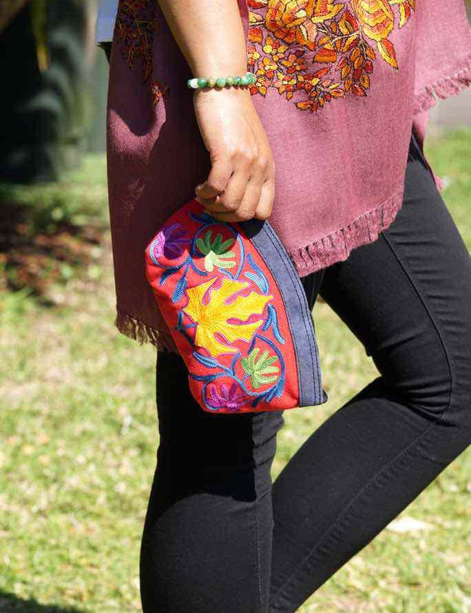 A special women pouch very light weight, ideal as a makeup bag or everyday use hand purse.