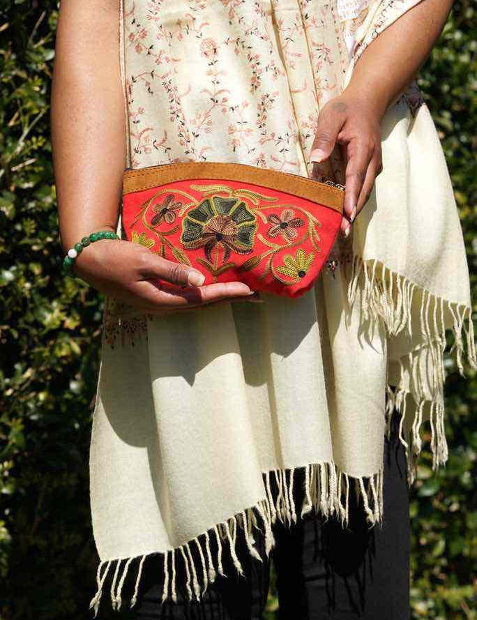 Women pouch purse with floral pattern, ultra-soft and lightweight. The pouch can be used as makeup bag or clutch that suit your style. Ethically made in Nepal.