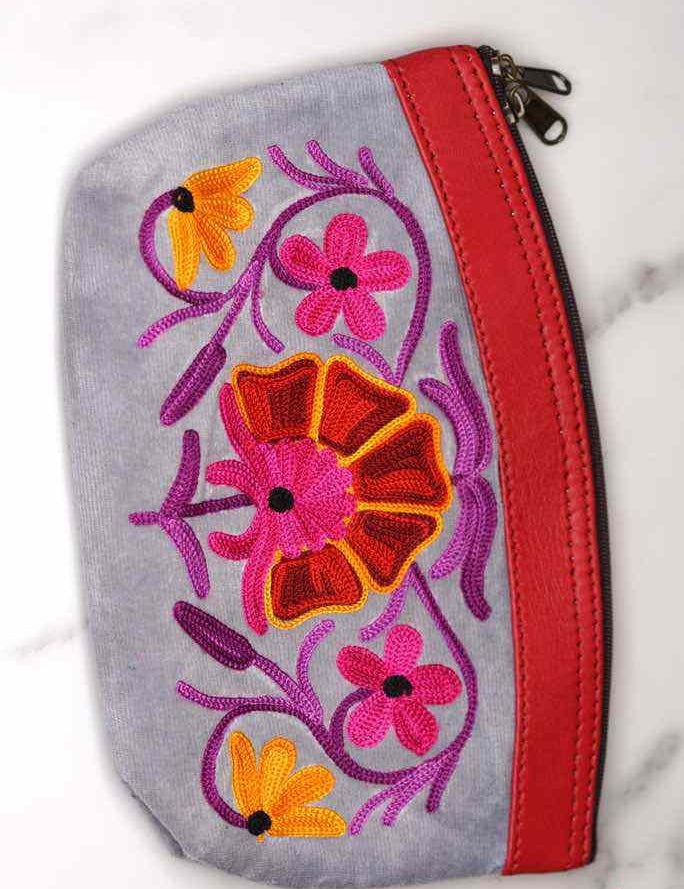 Women pouch purse with floral pattern, ultra-soft and lightweight. The pouch can be used as makeup bag or clutch that suit your style. Ethically made in Nepal.