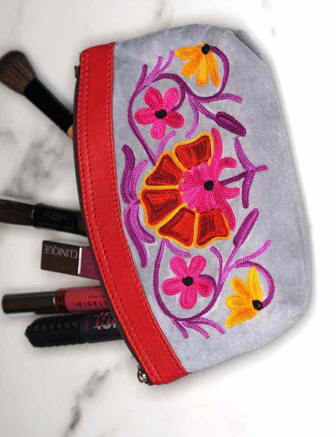 Women pouch purse with floral pattern, ultra-soft and lightweight. The pouch can be used as makeup bag or clutch that suit your style. Ethically made in Nepal.