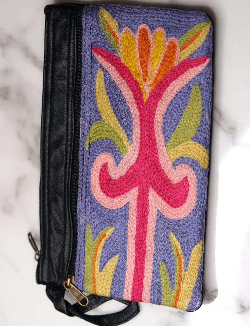 A stylish and ethically made wristlet purse to carry all your everyday essentials. 