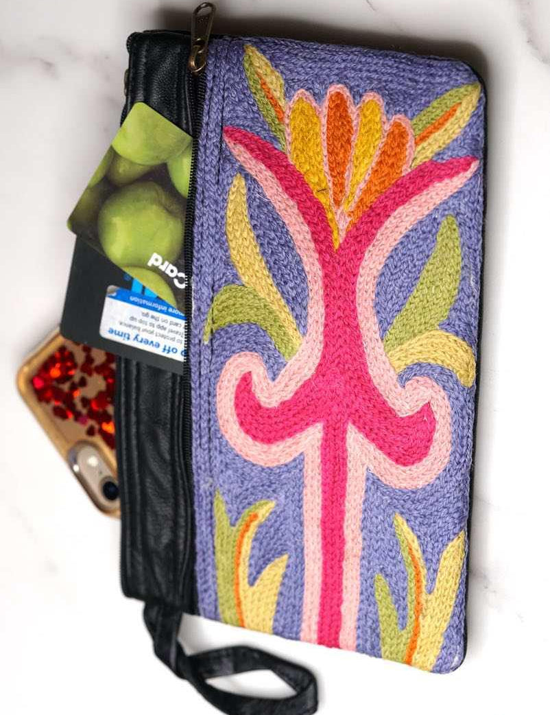 A stylish and ethically made wristlet purse to carry all your everyday essentials. 