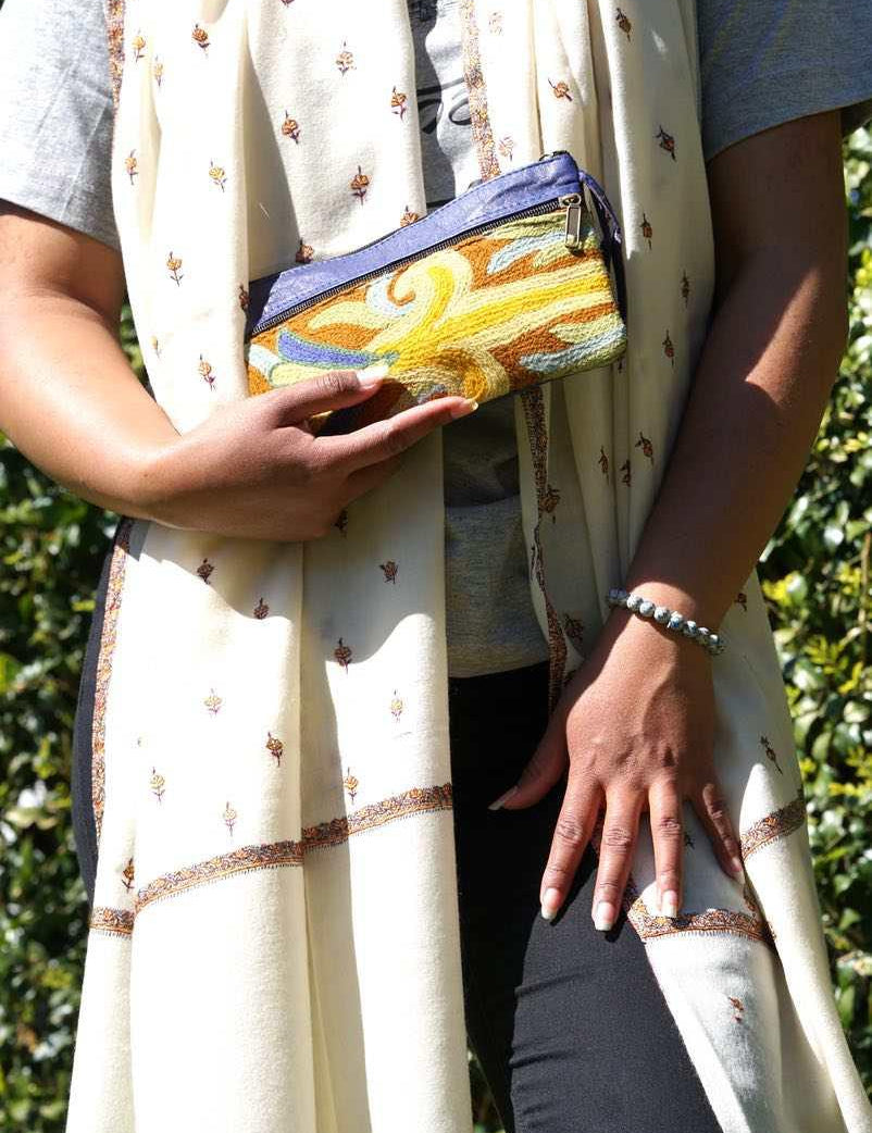 A stylish and ethically made wristlet purse to carry all your everyday essentials. 