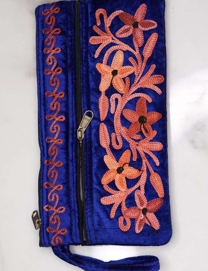 A unique style women's wristlet wallet with floral pattern, crafted ethically from Himalayas.