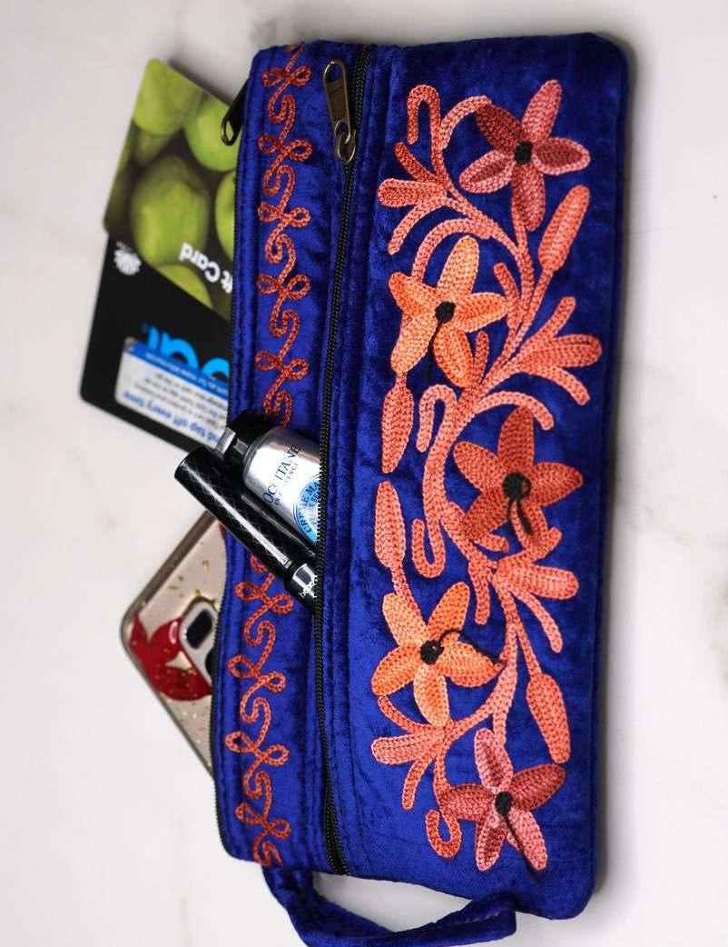 A unique style women's wristlet wallet with floral pattern, crafted ethically from Himalayas.