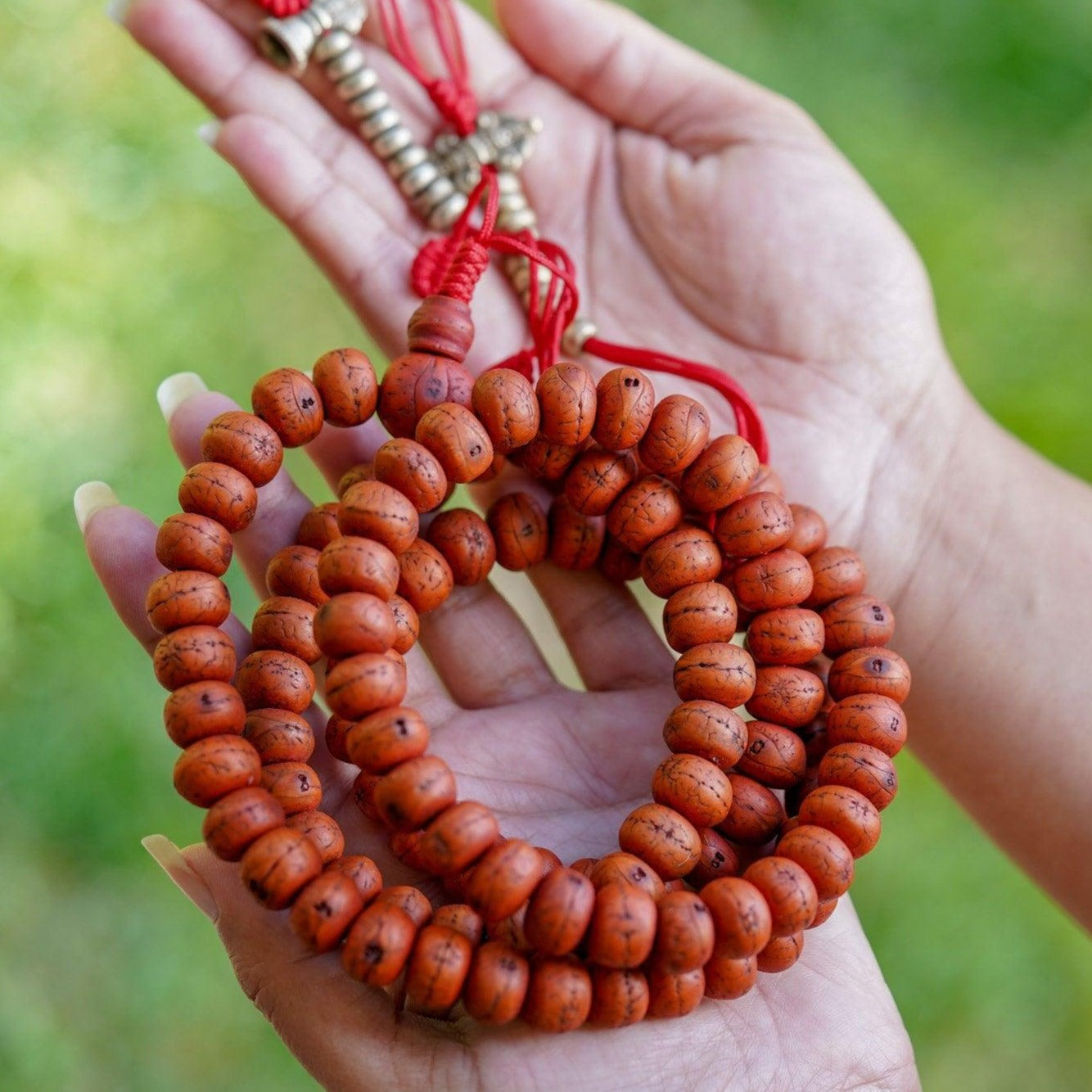 Vajra & Bell Dorje Bodhi Mala being held 